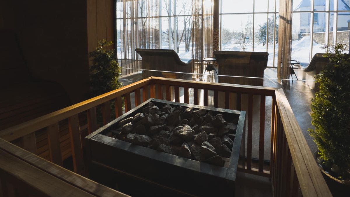 stove-bathhouse-spa-with-window-winter-landscape-1200x900 Cropped